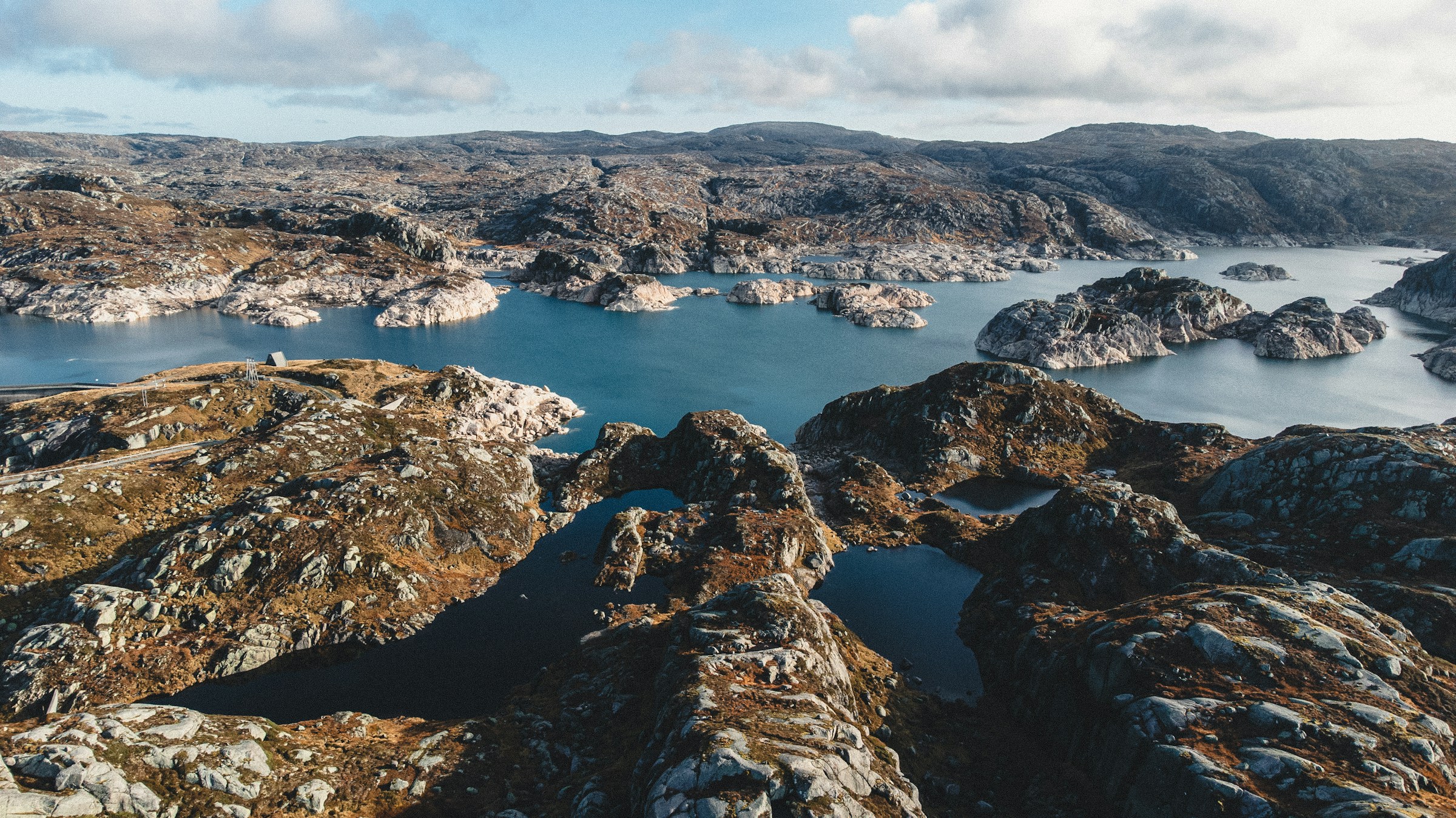 a large body of water surrounded by mountains